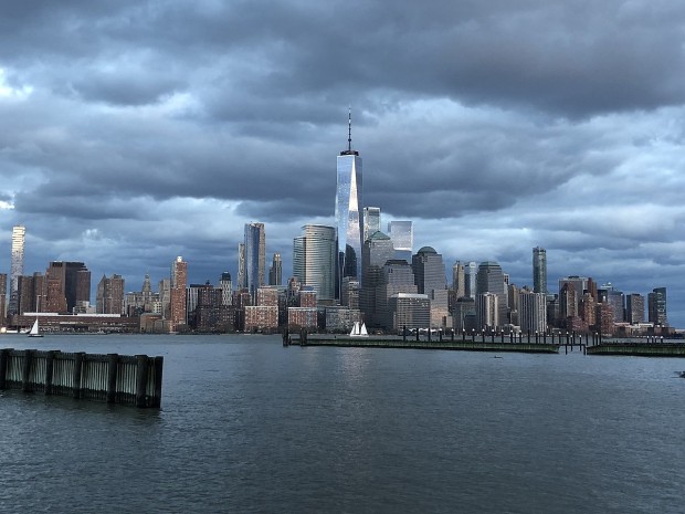 The concrete of hope against the silver sky. The Freedom Tower represents hope, courage and a landmark in American history. Like a Phoenix it has risen from the ashes!