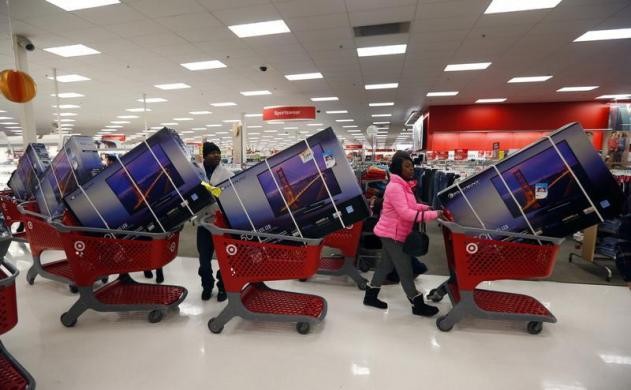 Thanksgiving Day holiday shoppers line up with television sets