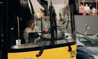 Man Driving a Bus