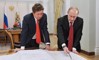 Russia's President Vladimir Putin (R) with Gazprom's Alexei Miller