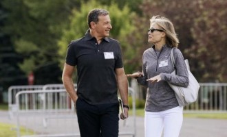 Robert Iger (L) and his wife Willow Bay