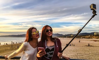 People Using Selfie Sticks