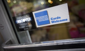 American Express Co. Credit Cards & Signage Ahead Of Earns Figures