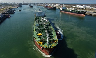 Views Of Tankers & Refineries As Oil Trades Near 12-Year Low